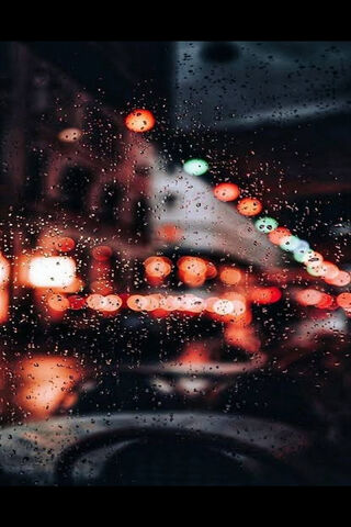 City Lights Through the Rain