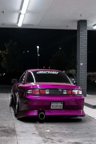 Sleek and Stylish: The Silvia S14 in Purple 💜🚗
