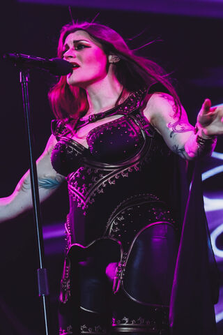 Powerful Performance: Floor Jansen in Action 🎤✨