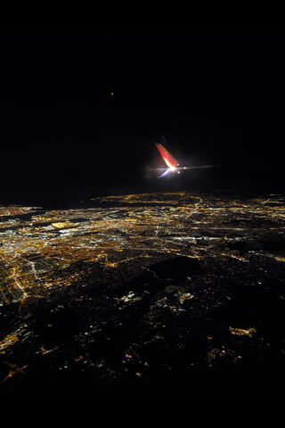 City Lights from Above: A Nighttime Flyover 🌌✈️