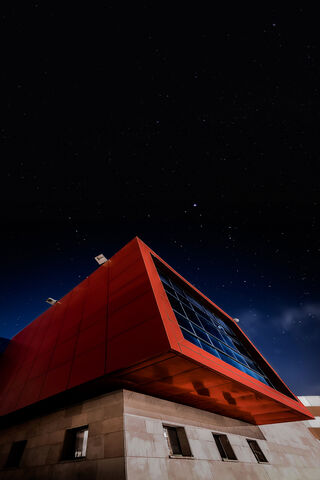 The Bold Red Cube: A Modern Marvel Under the Stars 🌌🔴