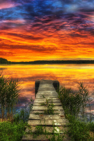 Sunset Serenity at the Wooden Dock 🌅