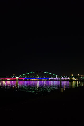 Colors of Connection: The Rainbow Bridge at Night 🌈✨