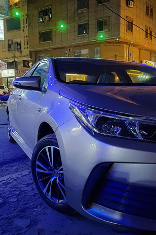 Sleek Night Drive: The Toyota Corolla Altis Shines Bright! 🚗✨