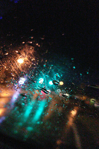 Raindrops and City Glow 🌧️✨