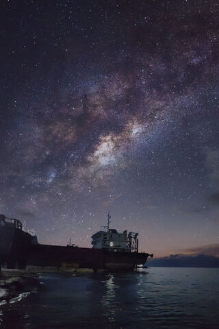 Starlit Serenity: A Night by the Shore 🌌🌊