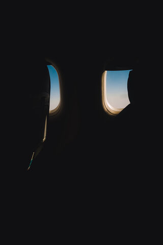 Window to the Sky: A Journey Awaits ✈️🌤️