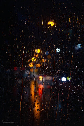 City Lights Through the Rain