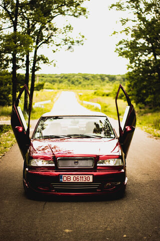 Cruising in Style: Suga's Shadowed Ride