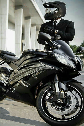 Unexpected Thrills: The Suited Rider 🏍️✨