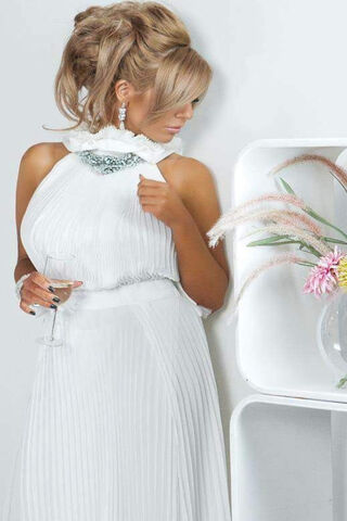 Elegance in White: Andrea T's Timeless Charm