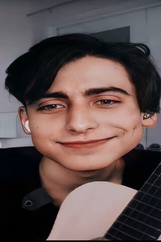 Strumming Smiles: Aidan Gallagher's Musical Moments 🎸😊