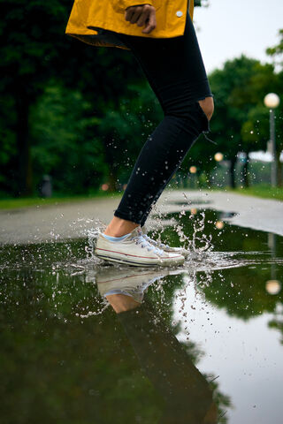 Splashing Joy in the Rain 🌧️💦