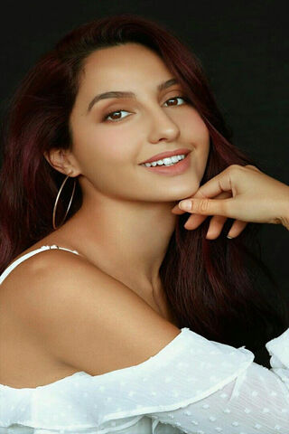 Radiant Charm: The Allure of Nora Fatehi ✨