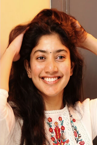 Radiant Smiles: The Charm of Sai Pallavi 🌟