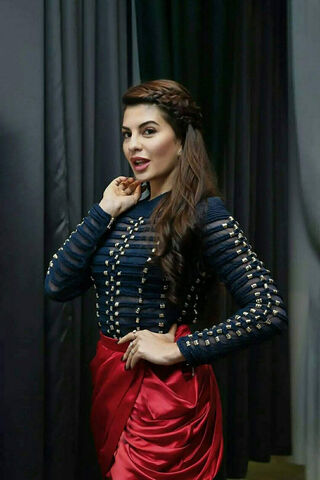 Elegance in Red: A Glamorous Moment