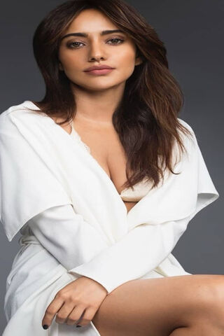 Elegance in Simplicity: Neha Sharma's Captivating Charm