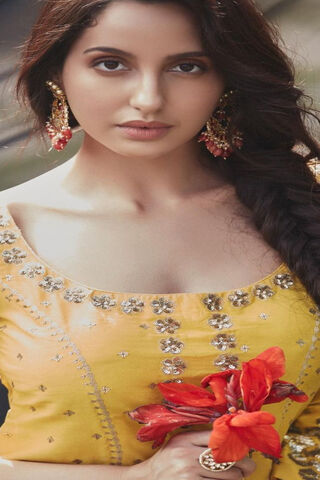 Radiant Elegance: Nora Fatehi in Traditional Splendor