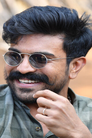 Charming Smiles: The Charismatic Ram Charan