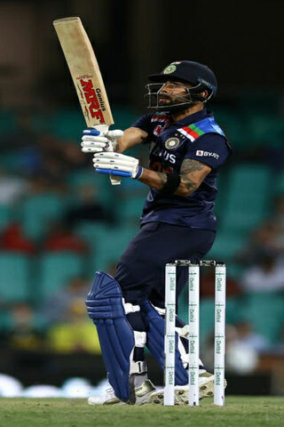 Virat Kohli: The Cricket Maestro in Action! 🏏🔥