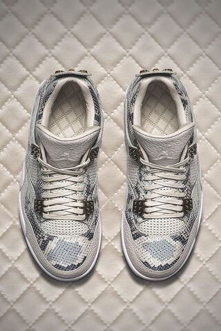 Sleek Style: Air Jordan 4 Retro in Python Print 🐍👟