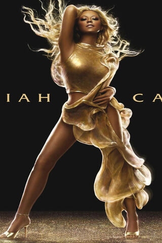 Glamour in Gold: Mariah's Iconic Style ✨