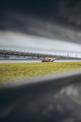 Racing Through the Shadows: Alex Marquez in Action 🏍️💨