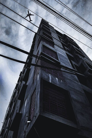 Urban Heights: A Glimpse into City Life 🌆✈️