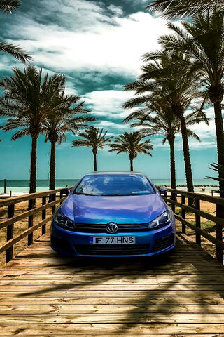 Cruising in Style: The VW Golf R GTI by the Beach 🌊🚗