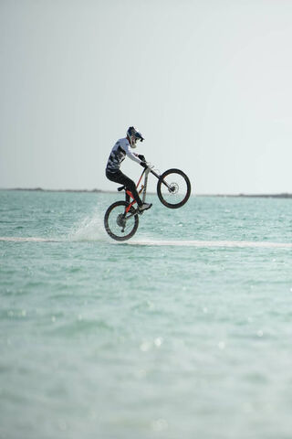 Thrills on Water: The Ultimate Dirt Bike Stunt! 🌊🏍️