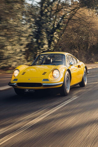 The Iconic Yellow Ferrari: A Classic on the Move! 🚗💨