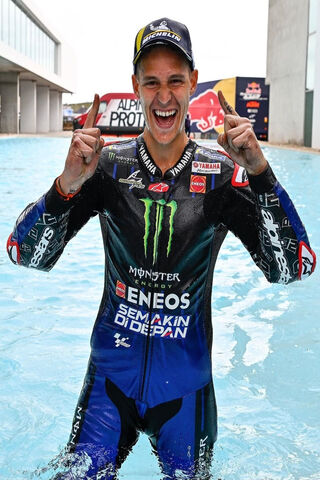 Fabio Quartararo: The Champion's Splash! 🏍️💦