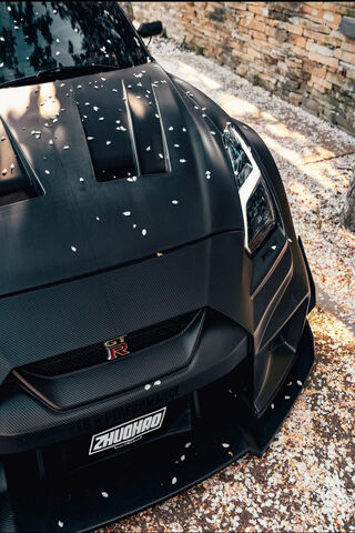 The Beast Unleashed: GTR R35 in Nature's Embrace 🌸🏎️