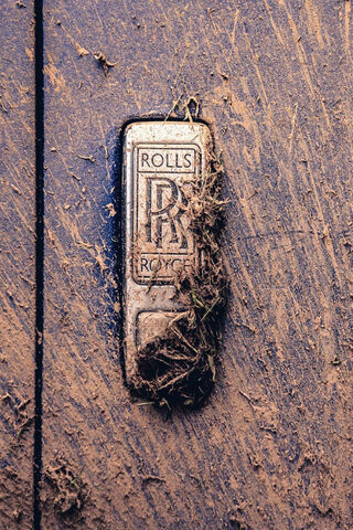 Elegance in the Mud: The Rolls-Royce RR Badge