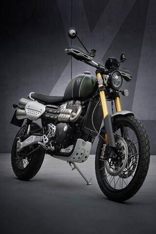 Conquer the Trails: The Triumph Scrambler Adventure Awaits! 🏍️🌄
