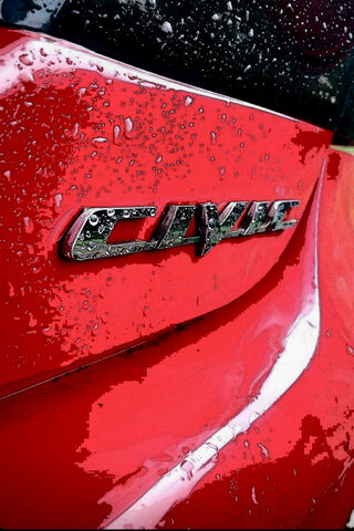 Shiny Red Honda Civic: A Splash of Style! 🚗💦