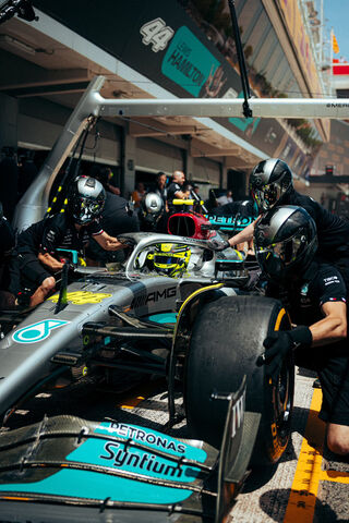 Pit Stop Precision: Lewis Hamilton's Team in Action! 🏎️💨
