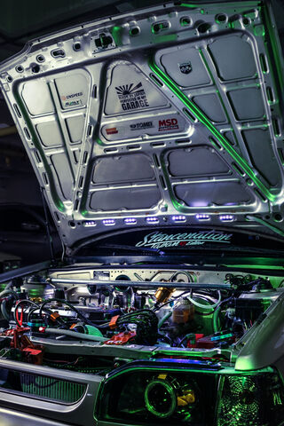 Under the Hood: The Mazda 323 Powerhouse 🚗💨