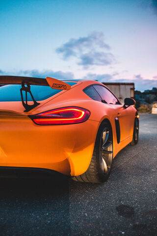Sunset Speedster: The Orange Porsche