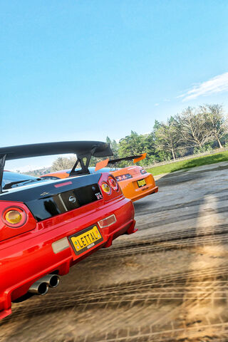 R34 vs. Supra: The Ultimate Showdown! 🚗💨