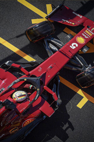 The Red Racer: Sebastian Vettel's Ferrari in Action! 🏎️🔥