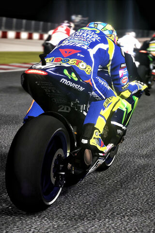 The Doctor in Action: Valentino Rossi's Racing Spirit 🏍️💨