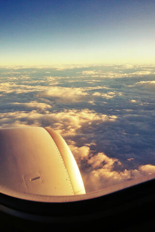 Soaring Above the Clouds 🌥️✈️