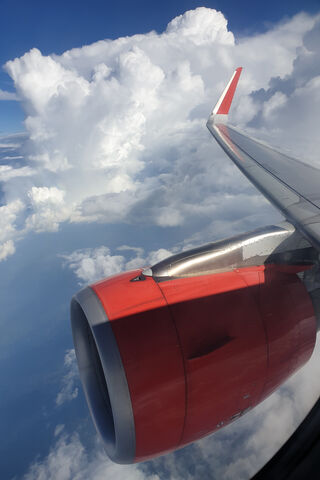 Soaring Above the Clouds 🌥️✈️