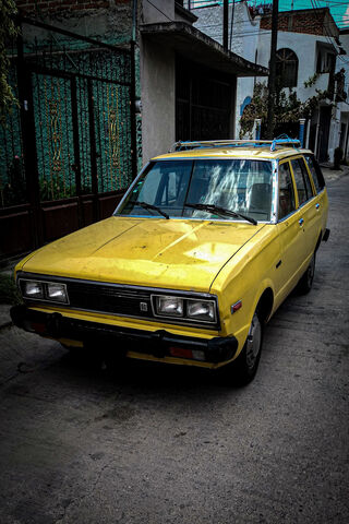Sunny Memories: The Classic Yellow Ride 🚗✨
