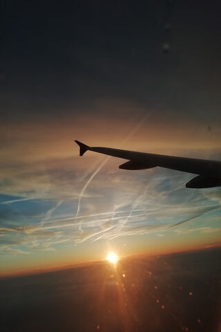 Soaring into the Sunset 🌅✈️