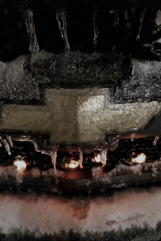 Frozen Chevy: A Winter's Embrace ❄️🚗