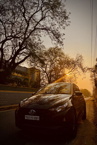 Hyundai i20: A Stylish Companion at Sunset 🌅