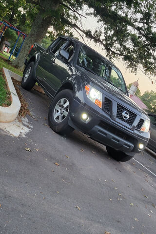 Nissan Frontier: The Adventurer's Pickup 🚙🌲