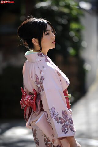 Elegance in Bloom: A Moment in Kimono